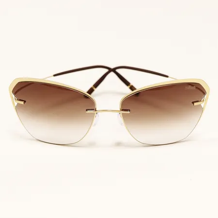 Solglasögon Silhouette, Mirabell 8174, brunt graderat glas, båge i guldfärgat titan, putsduk, folder, dustbag, fodral, ytterkartong.