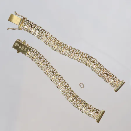 Klocklänk X-länk i två delar, samt två gulddetaljer, defekt, 18K  Vikt: 11 g