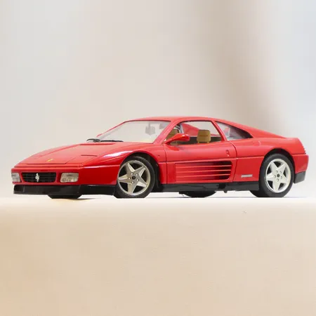 Modellbil Burago, Ferrari 348 Modena, Skala 1:18, längd 23cm, visst slitage, made in Italy, metall samt plast Skickas med paket.