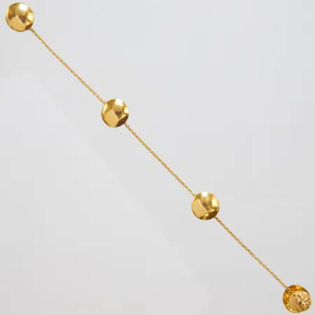 Dräktsmycke, ostämplat, 21K Vikt: 4,9 g