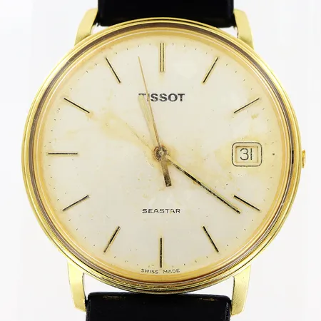 Herrur Tissot, 18K i boett, läderband, defekter, krona saknas, fuktskador, brv: 30,1gram
