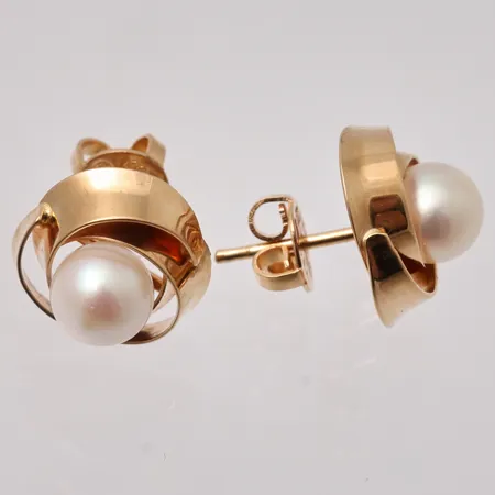 1par örhängen i 18K guld, mått Ø12mm, 1+1st pärlor, mått Ø6mm, bruttovikt 3,29g, ca nettovikt  2g.