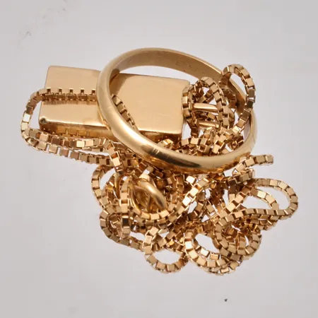 Diverse defekt guld, 18K, vikt 16,96g.