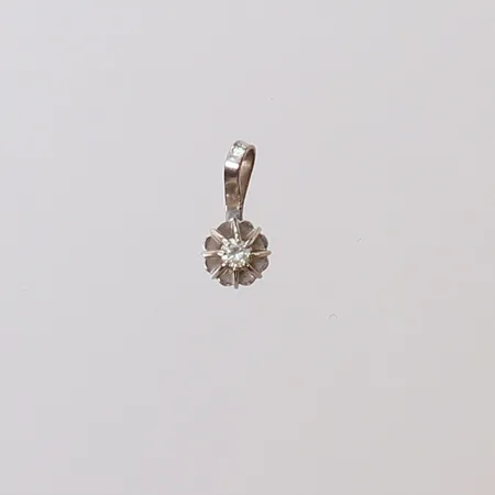 Hänge med briljantslipad diamant 1 x ca 0,02ct, 5x10,5mm ink ögla, sned ögla, GFAB, vitguld 18K.  Vikt: 0,3 g