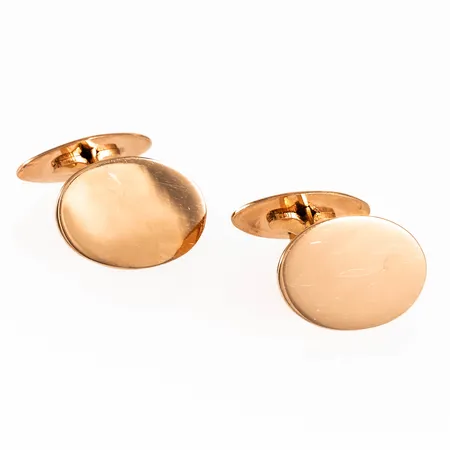 Ett par manschettknappar i 18K guld. De är 19 x 13 mm och väger 7,5g. Stämplad X8 (1948), EB (E G Blomqvist, Älmhult), 18K & kattfot.