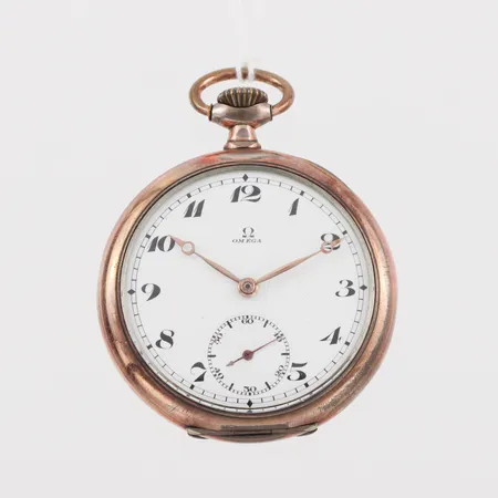 Fickur Omega, diameter ca 5 cm, silver, tickar igång men ej funktionstestad.