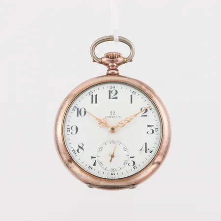 Fickur Omega, diameter ca 5 cm, silver, fungerar ej.