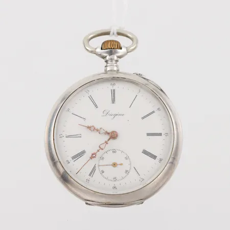 Fickur Diogene, tickar igång men ej funktionstestat, diameter ca 5 cm,silver,någon ojämnhet. Vikt: 0 g