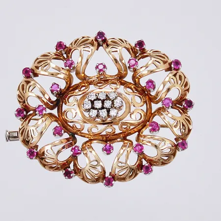 Brosch med röda stenar och diamanter ca 10x0,01ct, Ø ca 39mm, 18K