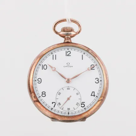 Fickur Omega, diameter ca 5 cm, silver, tickar igång men ej funktionstestad.