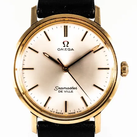 Herrur Omega Seamaster De Ville, Ø 34,5 mm, manuell, guld på stål, originalglas, krona och band, svaga repor på glaset. Namngravyr. 