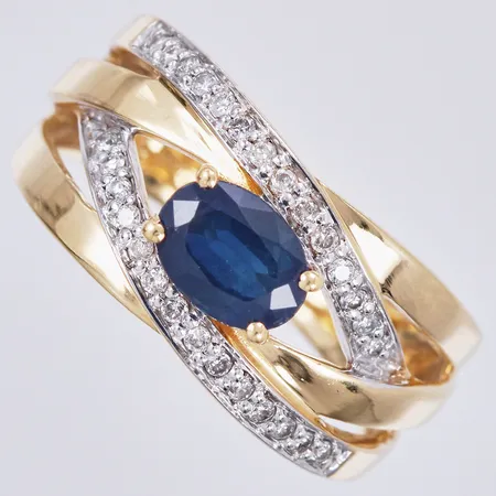 Ring med blå sten och diamanter ca 28x0,005ct, stl: ca 17¾, bredd: ca 4-10mm, GHA, 18K  Vikt: 5,8 g