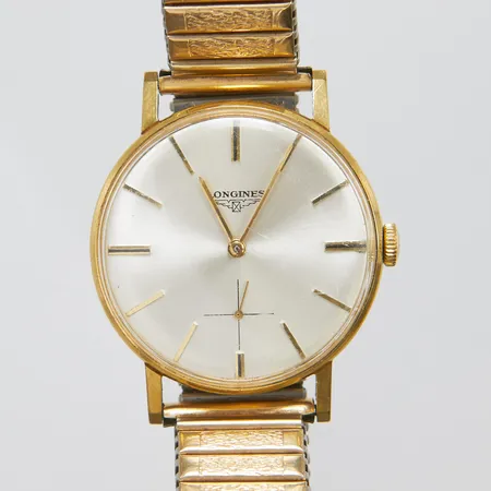 Herrur, Longines, 18K, Ø34mm, manuell, flexband, repigt glas, minutvisare något böjd, inga tillbehör, bruttovikt 62,2g