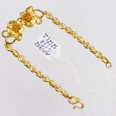 Armband, blommor, längd 16,5cm, bredd 4,4-14,4mm, s-lås, etikett kvar, 23K  Vikt: 15,9 g