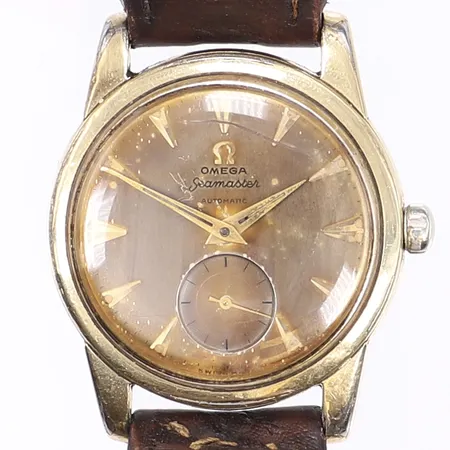 Herrur Omega Seamaster, Ø34mm, automat, liten sekundvisare, cal. 491, verknummer 14671359, boettnummer 2846-2848, guld på stål, tropisk urtavla, sprickor i glas, sliten dubble, smuts i urverk, sliten krona möjligen utbytt, tickar men ej testad för tidshållning, troligt servicebehov, defekt läderband, inga tillbehör Vikt: 0 g
