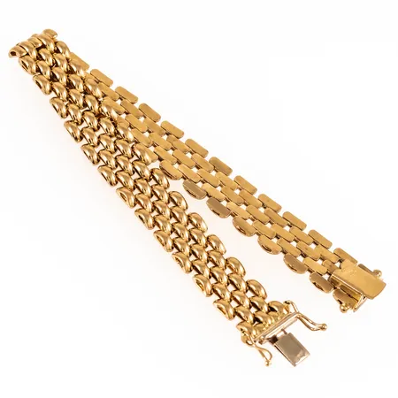 Armband, Korridor i 18K guld. Det är 19,3 cm långt, 11 mm brett och väger 24,9g. Kistlås.