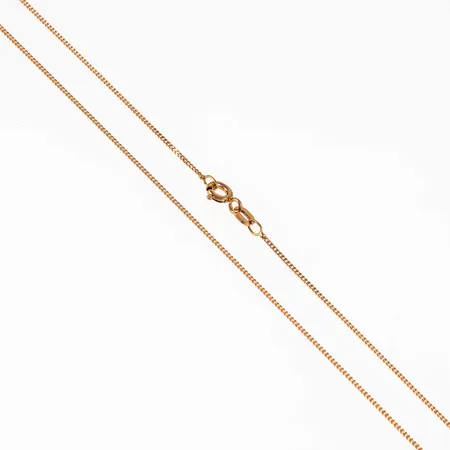 Kedja, Pansar i 18K guld. Den är 42 cm lång, 0,9 mm bred och väger 1,7g. Fint skick. Stämplad GHA, 750. Springring.