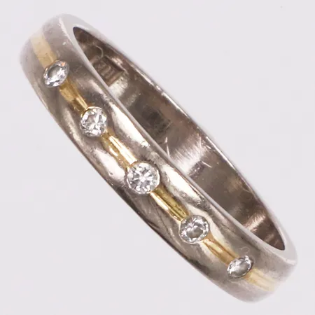 Ring, diamanter 0,10ctv enligt gravyr, stl 17, bredd 3,4mm, Engelbert år 1986, tvåfärgad, 18K  Vikt: 3,8 g