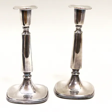 Ett par ljusstakar, 18cm, fylld botten, bruttovikt 403,4g, skevheter, silver 830/1000.