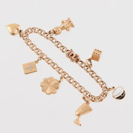 Armband Bismarck med 7 st berlocker, längd ca 17 cm, bredd 4.7 mm, 18k. Vikt: 13 g