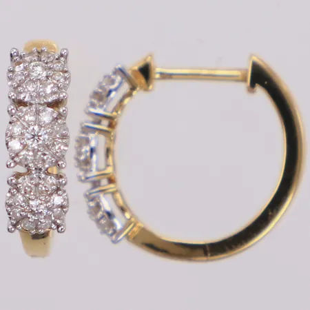 Ett par örhängen med diamanter 6xca0,01ct, 48xca0,005ct åttkantslipade, Ø14,6mm, bredd 1,8-3,9mm, GHA, 18K  Vikt: 2,4 g