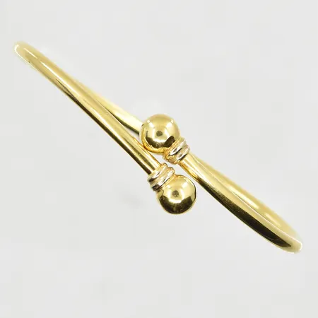 Armring, öppningsbar/flexibel modell, innermått 48x58 mm, oval passform, mindre bucklor, 18K. Vikt: 8,4 g