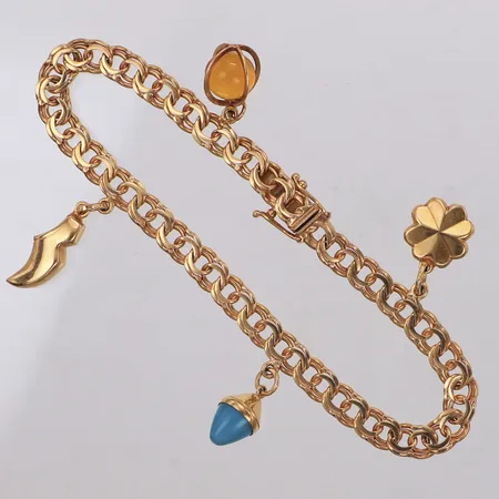 Armband Bismarck med fyra berlocker, längd 19cm, bredd 5,6-27,2mm, två med stenar, 18K  Vikt: 14,1 g