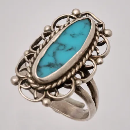  Ring i silver, stl 14, bredd 2,7-21mm, 1st turkos sten, mått 5x14,8mm, skev skena, vikt 2,47g.