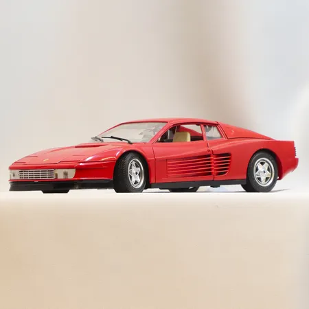 Modellbil Burago, Ferrari Testarossa, Skala 1:18, längd 25cm, visst slitage, made in Italy, metall samt plast Skickas med paket.