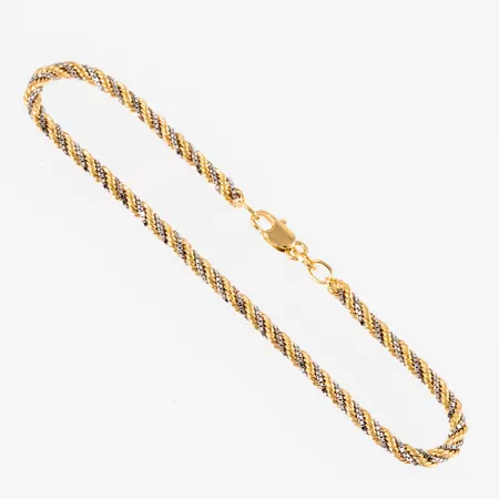 Armband, Cordel i 18K röd- och vitguld. Det är 18 cm långt, 2,7 mm brett och väger 3,5g. Fint skick. Karbinhake. Stämplad GFAB, 750. 