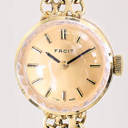 Damur Facit, boett samt X-länk i 18K, manuell, Ø21mm, plastglas med slitage, något slappt lås, repig länk, boett med repor samt bucklor, bruttovikt: 17,6g