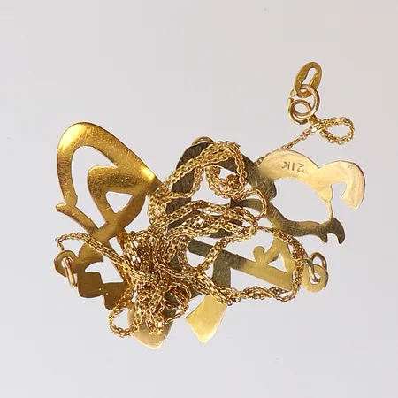 Guldskrot, defekt, 21K.  Vikt: 3,9 g