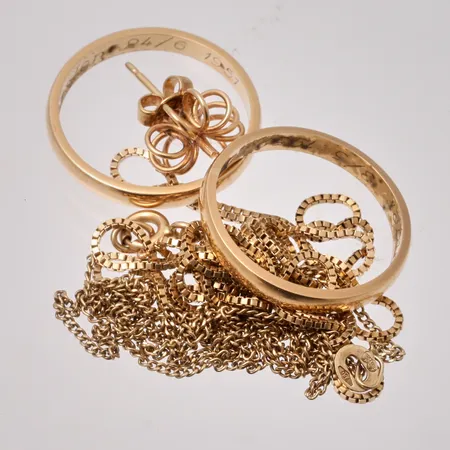 Diverse defekt guld, 18K, vikt 12,4g.