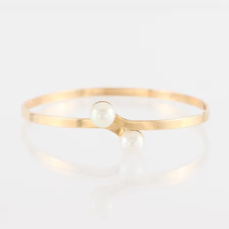Armring stel med 2 st pärlor, ojämn form, diameter ca 6 cm, Mattinsson Aktiebolaget Stockholm, 18k. Vikt: 12 g