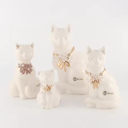 Porslinskatter 4 st, Rosa Ljung, höjd ca 12-24 cm. Skickas med postpaket.