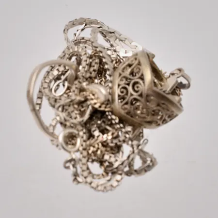 Diverse defekt silver, 830/1000, vikt 32,11g.