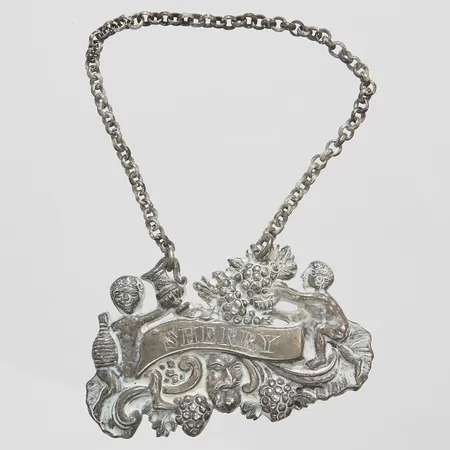 Karaffetikett, "Sherry", 60x37mm, Adolf Lillja, Stockholm, 1846, missfärgad, silver Vikt: 11,7 g