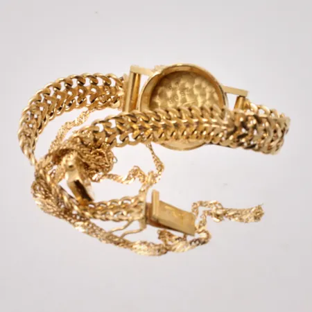 Diverse defekt guld, 18K, vikt 19,8g.