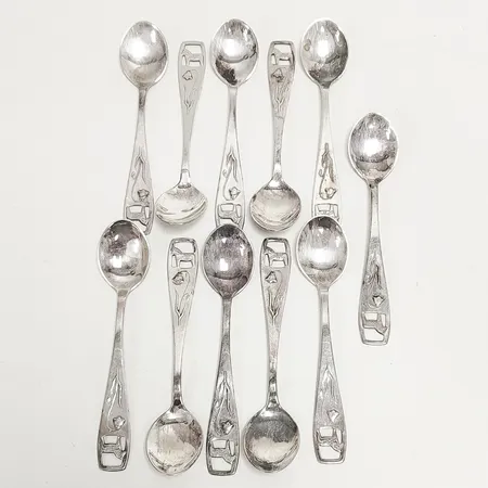 11 Kaffeskedar med motiv av Dalahäst samt blåklocka, längd: 107mm, Alton, Falköping, silver, 830/1000 Vikt: 123,8 g