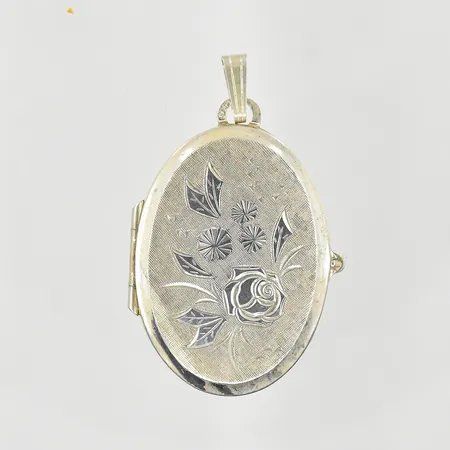 Hänge medaljong med blommotiv, längd 40 mm, bredd 23 mm, öppningsbar, glasinsats, 835/1000 silver. bruttovikt 11,1g Vikt: 11,1 g