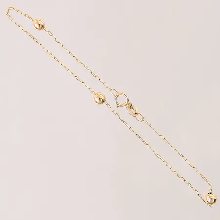 Armband med integrerade kulor, längd: 19,5cm, bredd: 1-4mm, smärre bucklor på länkbitar, 18K  Vikt: 1,3 g