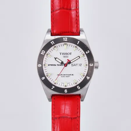 Herrur Tissot PRS 516, automat, ca Ø40mm, safirglas, glasbaksida, automat, med rött läderband, inga tillbehör