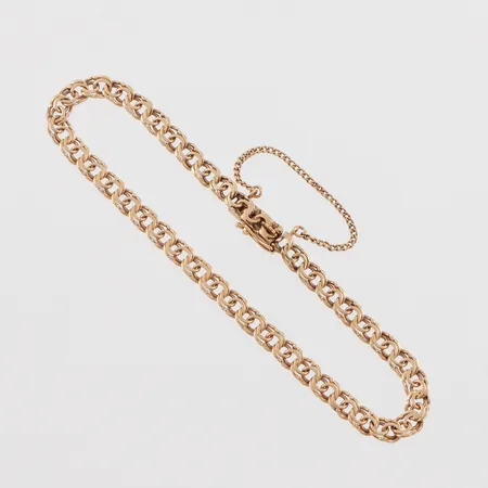 Armband Bismarck, slitage, längd ca 18 cm, bredd ca 4.3 mm, 18k. Vikt: 7 g