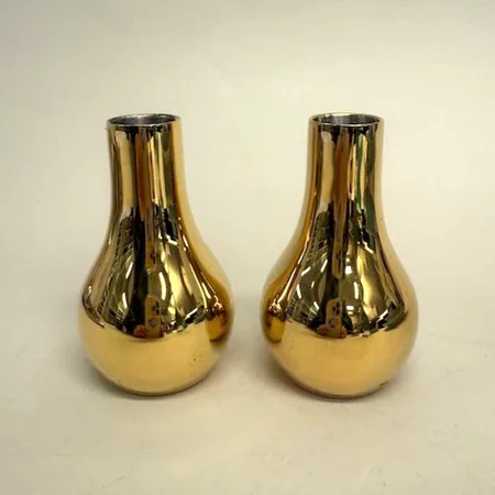 Ett par ljusstakar, Cafu, Georg Jensen, höjd 10cm, guldfärgat stål Vikt: 0 g Skickas med paket.