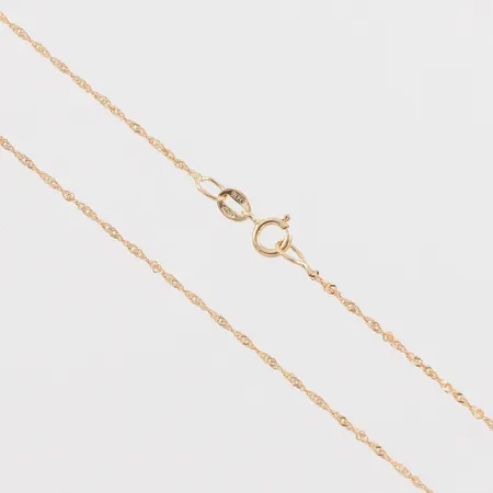 Collier, längd ca 24 cm, bredd 1 mm, 18k. Vikt: 1,2 g