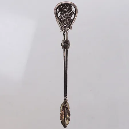 Sockertång med rosdekor, längd 11cm, Finland, monogramgravyr, silver 813/1000 Vikt: 24,4 g