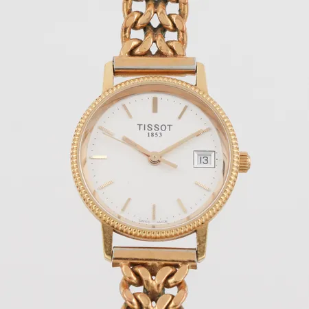 Damur Tissot, fungerar ej, diameter 23.9 mm, 18k i uret, gulmetall i bandet. Vikt: 0 g