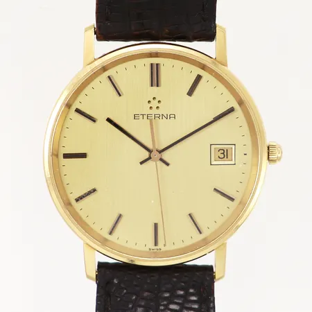 Herrur Eterna, quartz, defekt, 18K i boett, bruttovikt: 27,1 gram