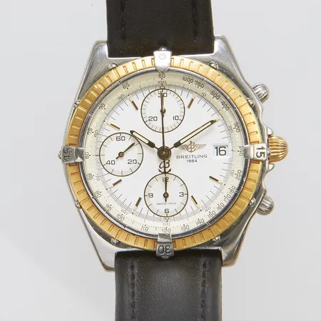 Herrur Breitling Chronomat, stål/guld, automatisk, 39mm, ref: D13047, snr: 1 10910, Cal. B13, safirglas, datum, kronograf, läderband ej original, bygelspänne, inga tillbehör.