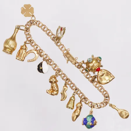 Armband, Bismarck, berlocker, 19cm, Nordiska Guldvaru-Aktiebolaget år 1960, säkerhetskedja saknas, buckliga vissa berlocker, 18K  Vikt: 21,6 g